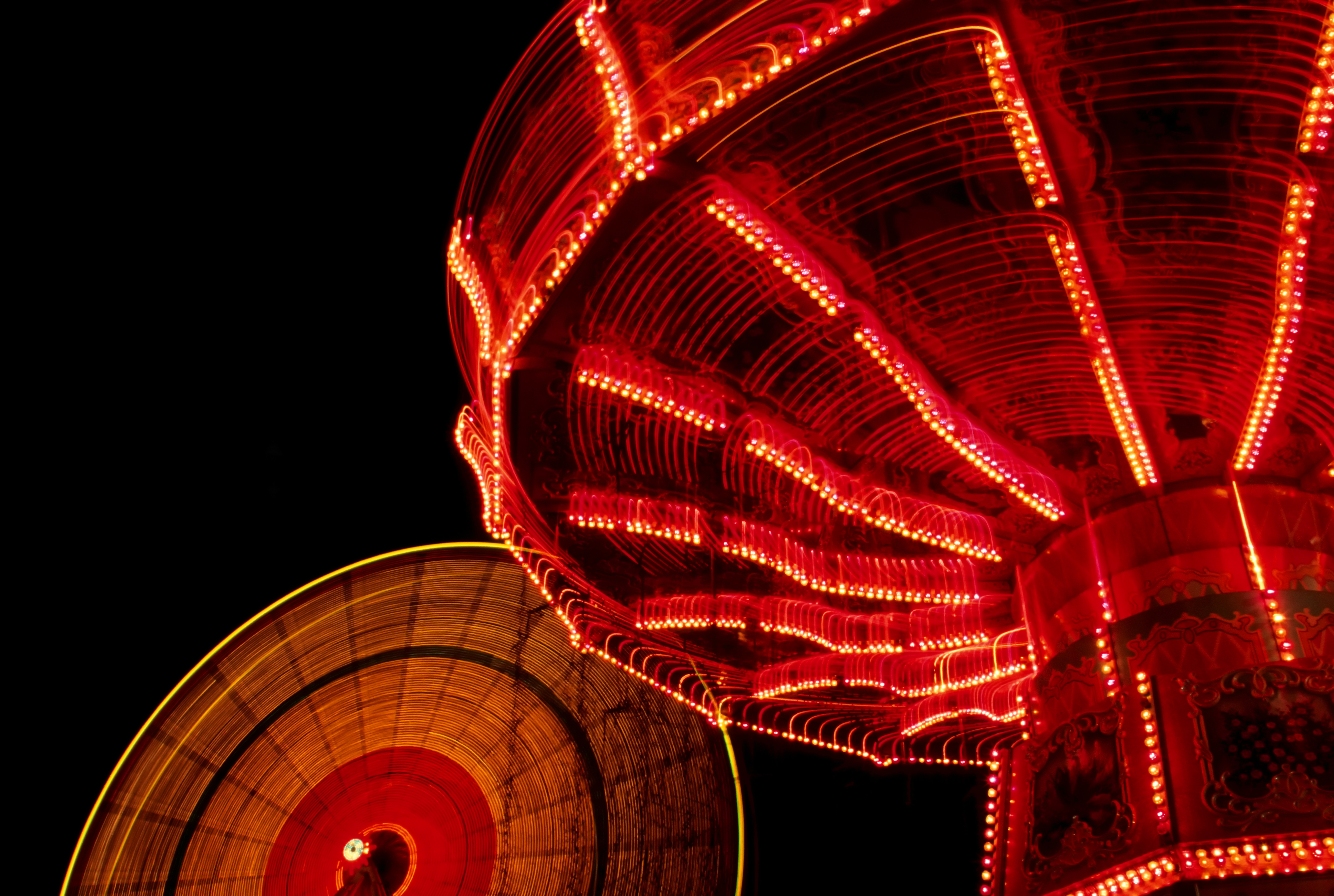 Spinning Amusement Park Rides at night.